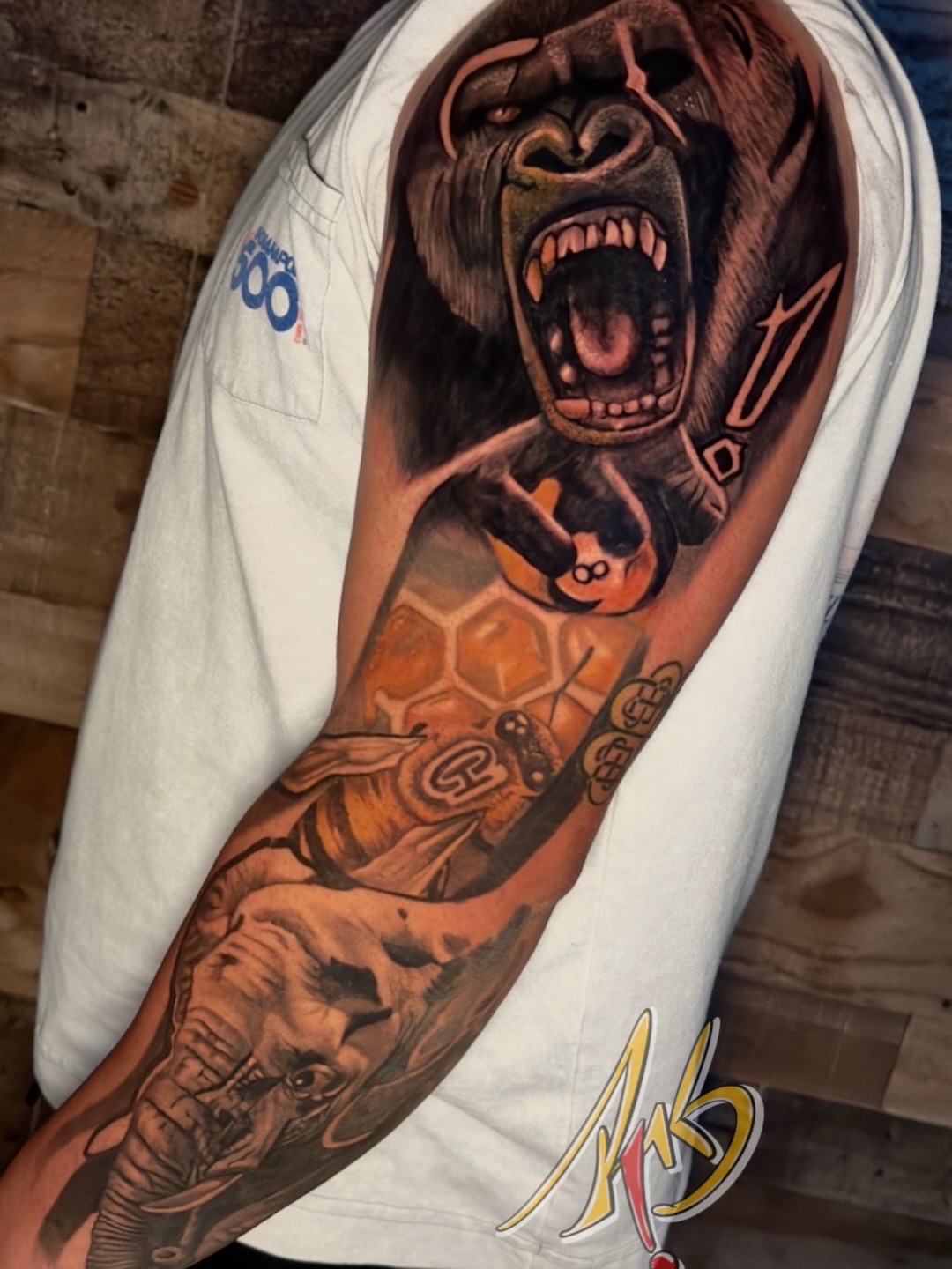 Full realism sleeve featuring a gorilla, bee and elephant by Ramón Santiago at R INKS ARTS